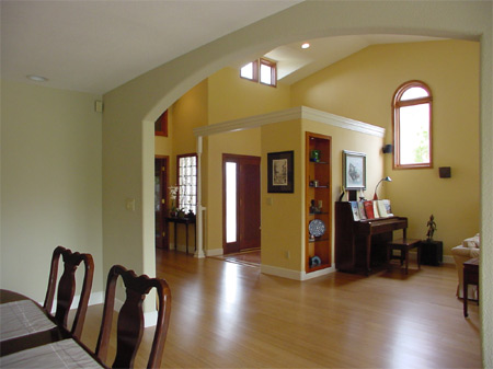 Living Room - View from dining room towards entry.